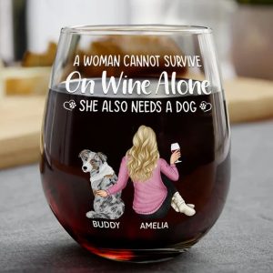 A Woman Cannot Survive On Wine Alone Dog Mom - Personalized Stemless Wine Glass